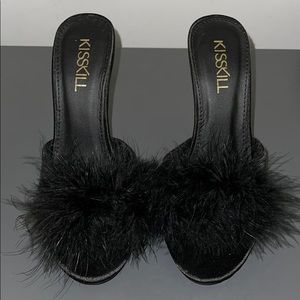 Black feather mules
